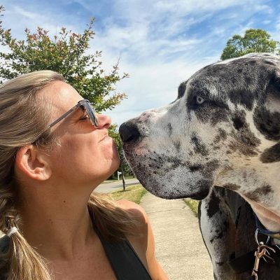 Hands N Paws dog walker sharing a sweet moment with a Great Dane in Columbus, Ohio